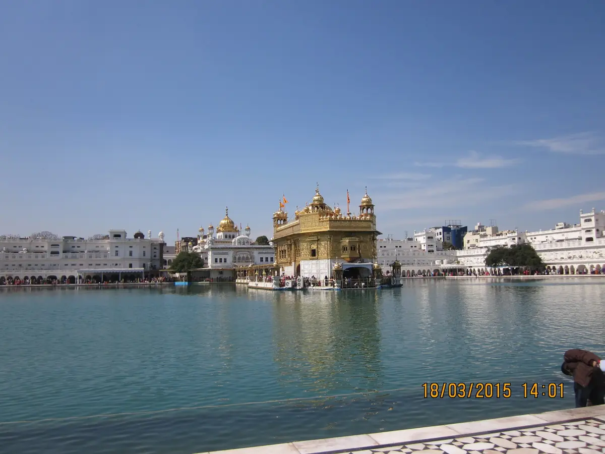 The Amrit Sarovar with the temple in the distance