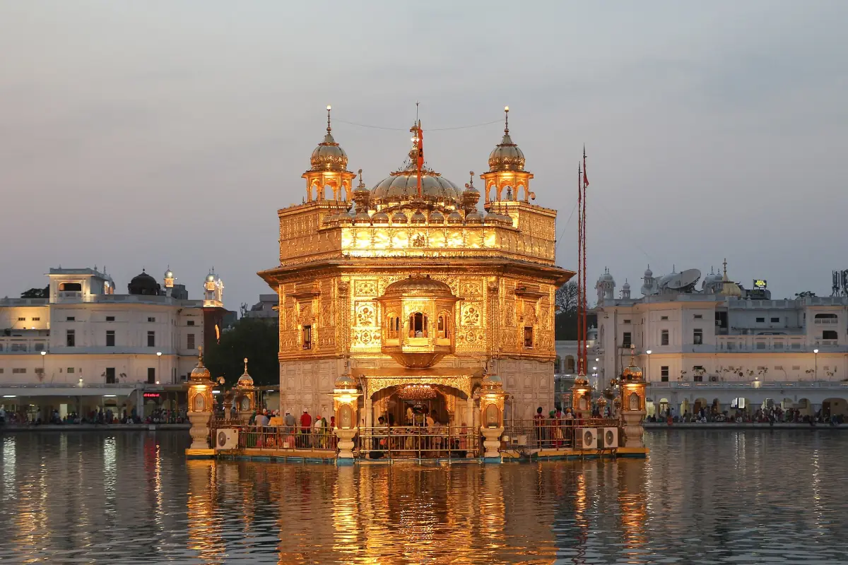 The Golden Temple lit at dusk