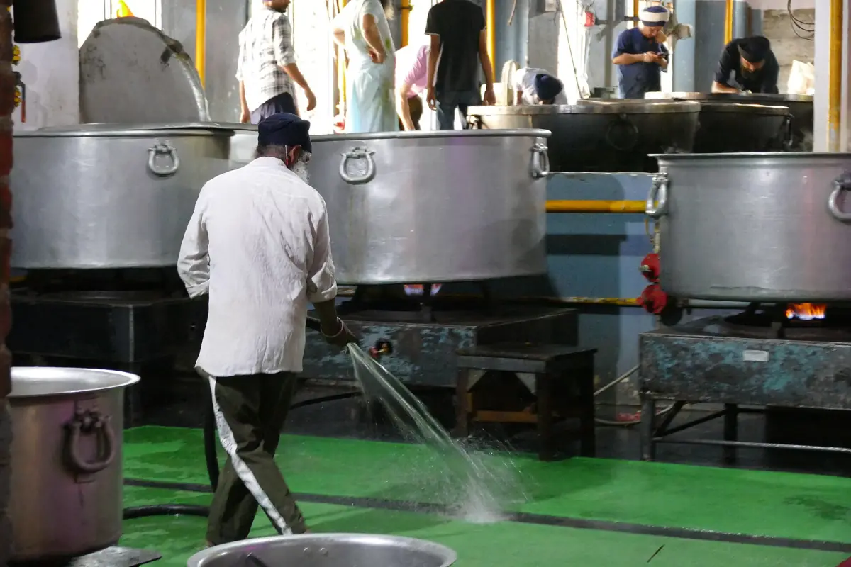 Cooking in the kitchen of the Guru Ram Das Langar