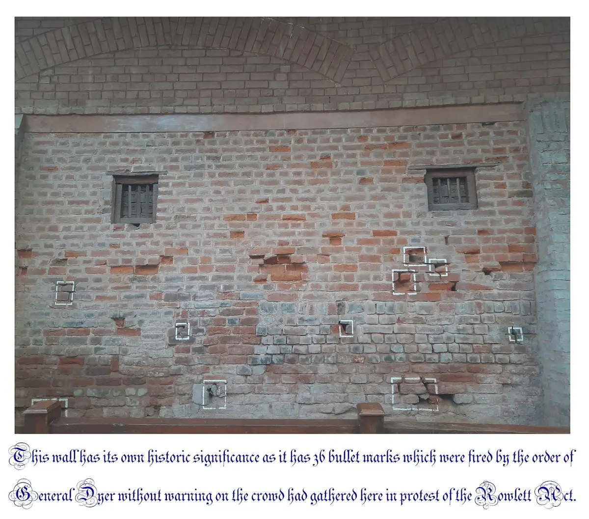 A wall at Jallianwala Bagh with marked bullet holes
