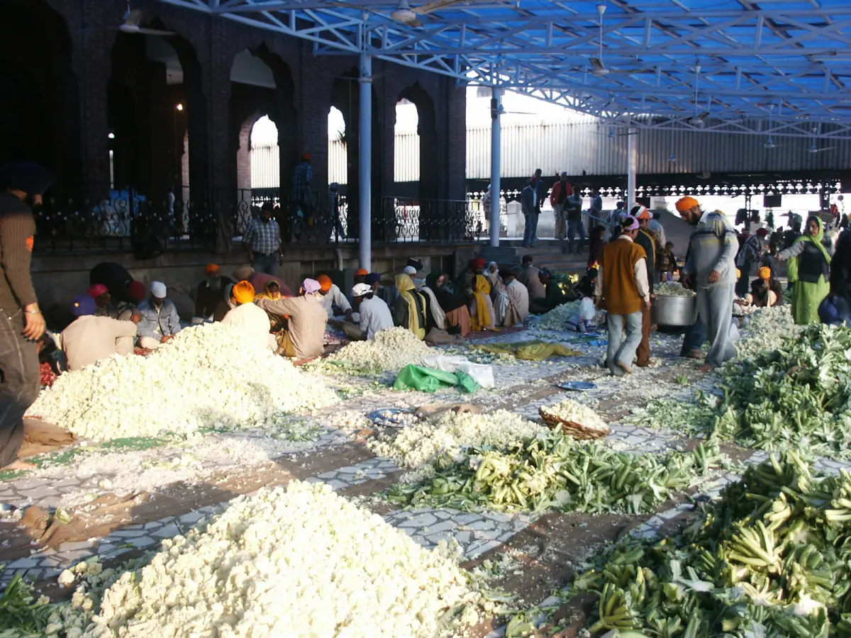 Volunteers preparing food for the langar