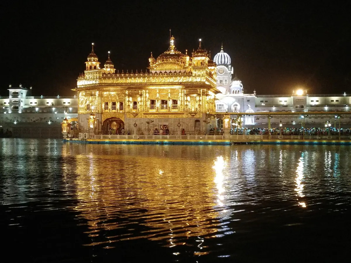 The sarovar and the temple complex at night