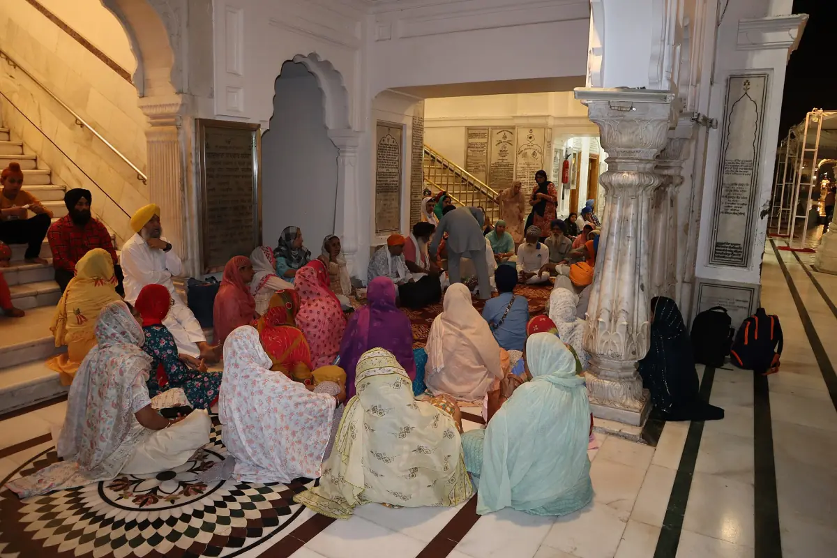 A congregation of pilgrims seated together